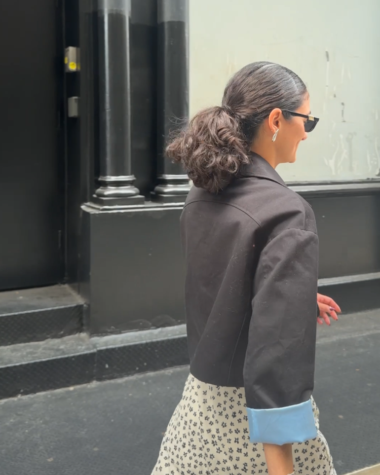 Woman walking on the street.