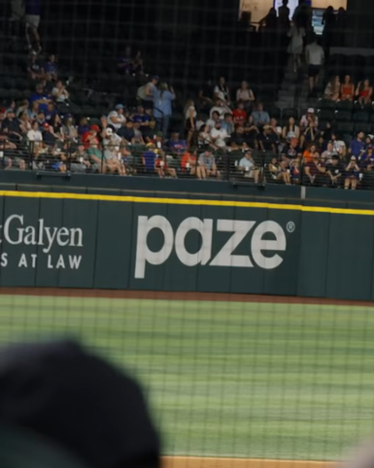 The Paze logo on the outfield wall.