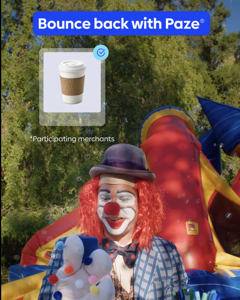 A party clown buying coffee with Paze.